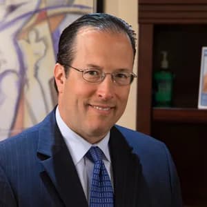 Dr. Andrew J. Miller